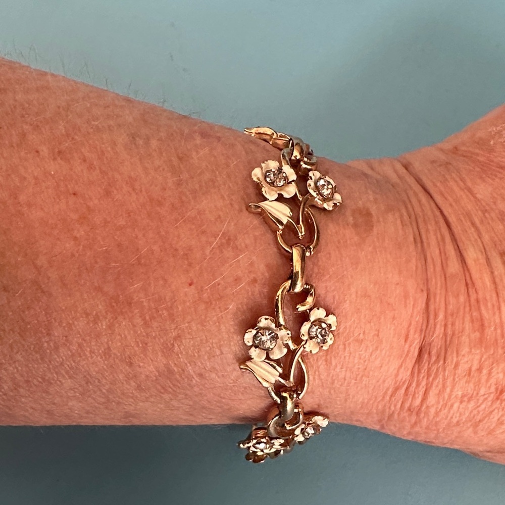 Floral Gold tone Coro Bracelet with Delicate flowers and rhinestone accent